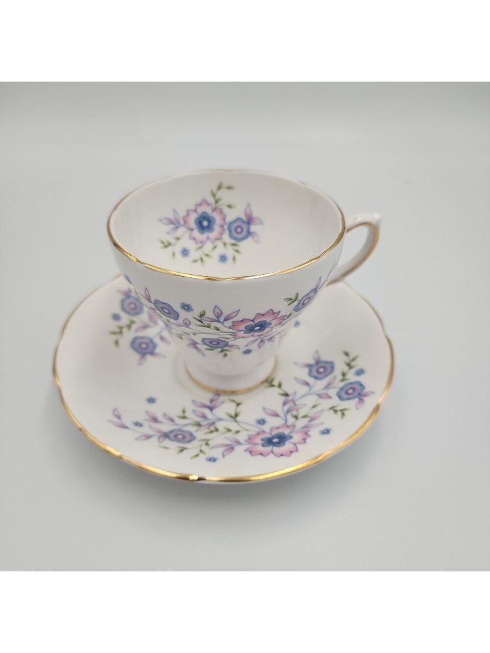 Vintage Avon 1974 Blue Blossoms Fine Bone China Cup & Saucer Made In England